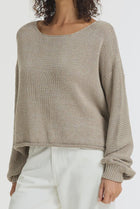  BLAK - The Close Sweater is a light mocha cotton sweater with silver lurex detailing, designed to bring subtle shimmer to everyday knitwear. Knitted from breathable cotton yarn with a chunky textured finish, it has an easy, relaxed shape that feels effortless to wear.