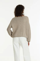  BLAK -The Close Sweater is a light mocha cotton sweater with silver lurex detailing, designed to bring subtle shimmer to everyday knitwear. Knitted from breathable cotton yarn with a chunky textured finish, it has an easy, relaxed shape that feels effortless to wear.