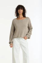  BLAK -The Close Sweater is a light mocha cotton sweater with silver lurex detailing, designed to bring subtle shimmer to everyday knitwear. Knitted from breathable cotton yarn with a chunky textured finish, it has an easy, relaxed shape that feels effortless to wear.