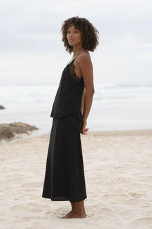 The LILLY PILLY FRANKIE SILK CAMI is made with 100% bluesign-certified silk for a luxurious feel. Boasting a bias cut and lace accents on the front and back, this cami features French seams for a polished touch.

∙ Bias cut silk cami
∙ Lace neckline front and back
∙ French seam