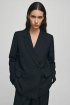 MSCH Machella Blazer - Strong Tailoring, Subtle Detail

A blazer with presence. The MSCH Machella Blazer brings together strong tailoring and an easy oversized silhouette, creating a modern layer that works just as well with denim as it does with tailored separates.
