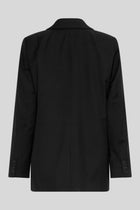 MSCH Machella Blazer - Strong Tailoring, Subtle Detail

A blazer with presence. The MSCH Machella Blazer brings together strong tailoring and an easy oversized silhouette, creating a modern layer that works just as well with denim as it does with tailored separates.