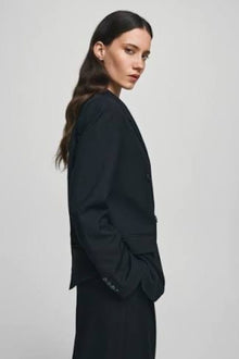 MSCH Machella Blazer - Strong Tailoring, Subtle Detail

A blazer with presence. The MSCH Machella Blazer brings together strong tailoring and an easy oversized silhouette, creating a modern layer that works just as well with denim as it does with tailored separates.