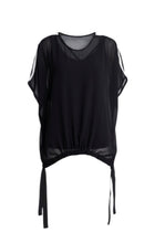 A true N-E-S icon, the Vanotti Tape Top is the piece customers return for season after season. Light, relaxed and beautifully easy to wear, it’s designed to be your effortless throw-on style for days when comfort and simplicity matter most.