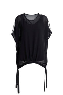A true N-E-S icon, the Vanotti Tape Top is the piece customers return for season after season. Light, relaxed and beautifully easy to wear, it’s designed to be your effortless throw-on style for days when comfort and simplicity matter most.