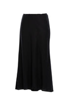 A best-selling staple, reimagined in a breathable linen blend. The N-E-S Linen Muse Skirt is designed to flatter through movement and cut, offering an easy yet elevated piece that works across seasons and occasions.

Cut on the bias, the Muse Skirt skims the body with a soft, fluid drape that enhances its natural shape without clinging. The signature concave front and subtly dropped back hem create a modern, directional silhouette, while the raw hemline adds an understated edge.