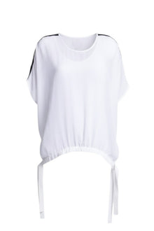 A true N-E-S icon, the Vanotti Tape Top is the piece customers return for season after season. Light, relaxed and beautifully easy to wear, it’s designed to be your effortless throw-on style for days when comfort and simplicity matter most.
