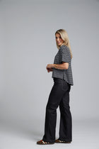 NES DollyB Denim Pants by N-E-S – a wide-leg stretch denim pant with fold-down rib waistband and contrast stitching. Available in blue or black denim. NZ made.