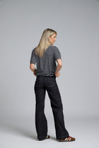 NES DollyB Denim Pants by N-E-S – a wide-leg stretch denim pant with fold-down rib waistband and contrast stitching. Available in blue or black denim. NZ made.