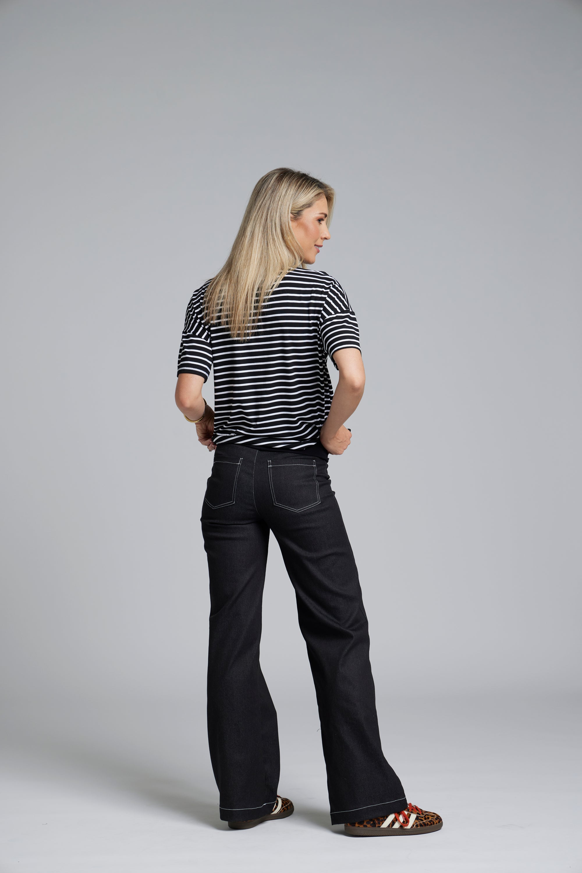 NES DollyB Denim Pants by N-E-S – a wide-leg stretch denim pant with fold-down rib waistband and contrast stitching. Available in blue or black denim. NZ made.