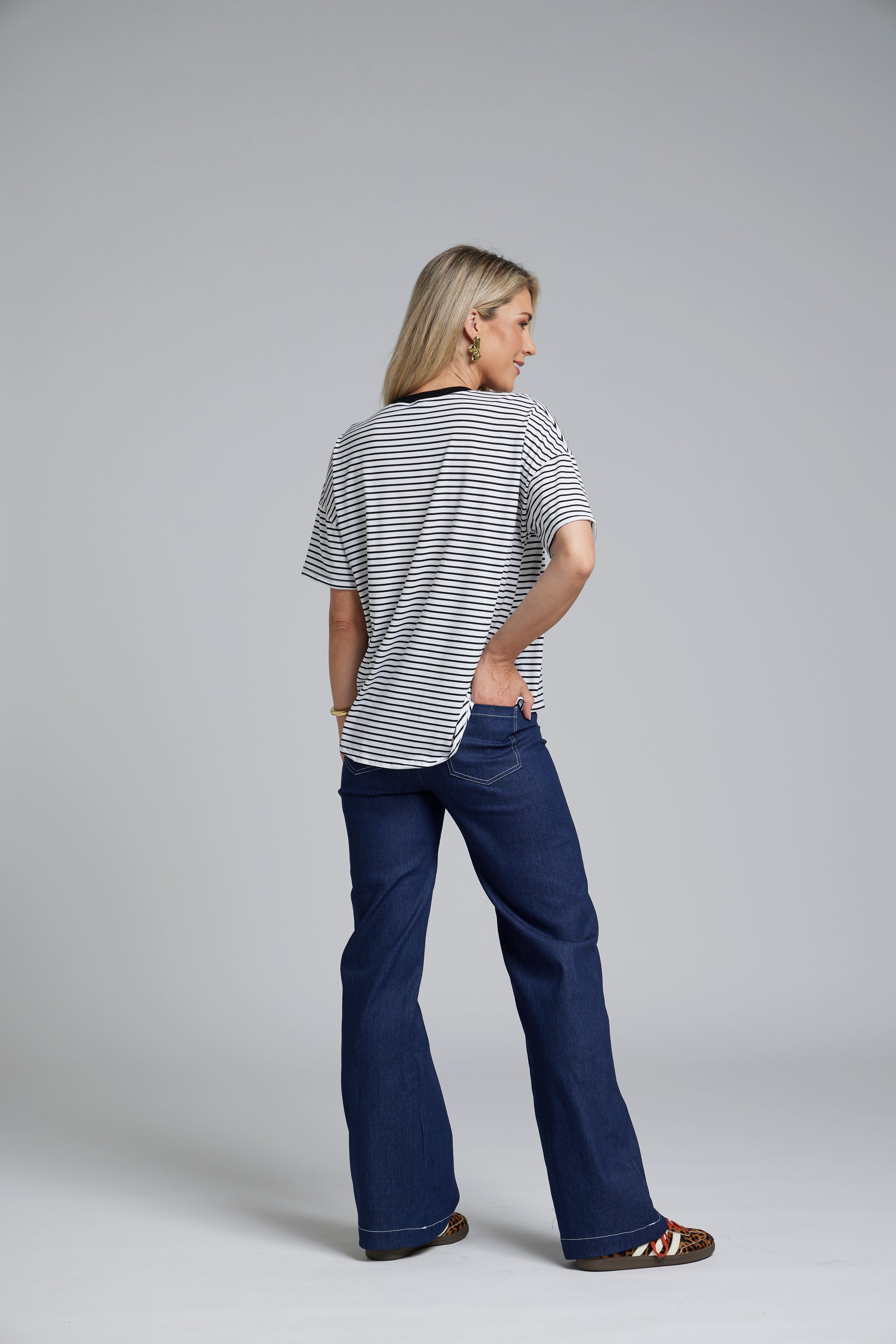 NES DollyB Denim Pants by N-E-S – a wide-leg stretch denim pant with fold-down rib waistband and contrast stitching. Available in blue or black denim. NZ made.