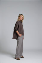The NES Ginnie Pants by N-E-S – a classic straight leg pant with centre pin stitch seam, elastic back waist and comfort stretch fabric. NZ made.