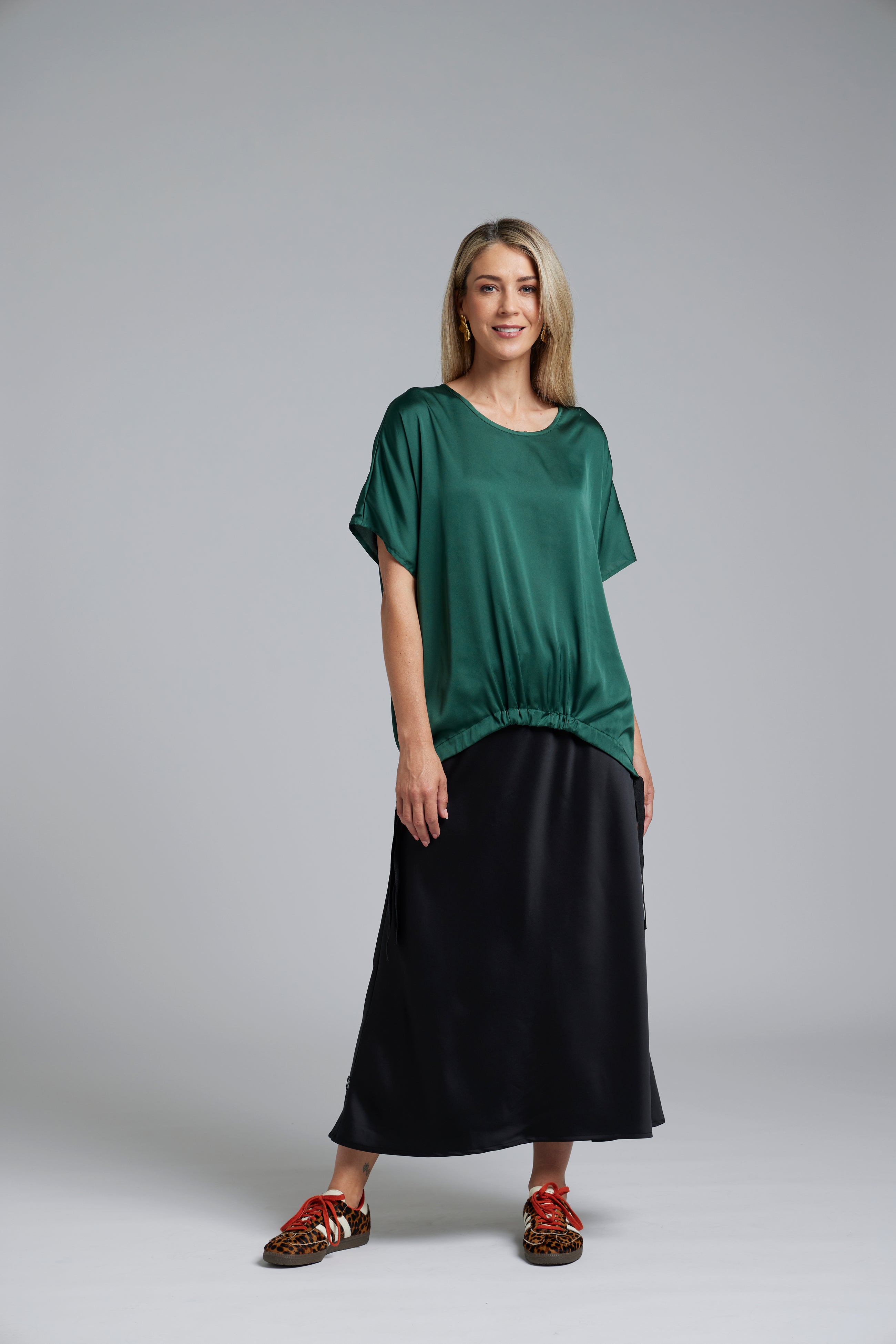 The NES Muse Satin Skirt – a full-length hammered satin skirt with bias cut, elasticated waist and soft high-low hem. Elegant and easy. NZ made.