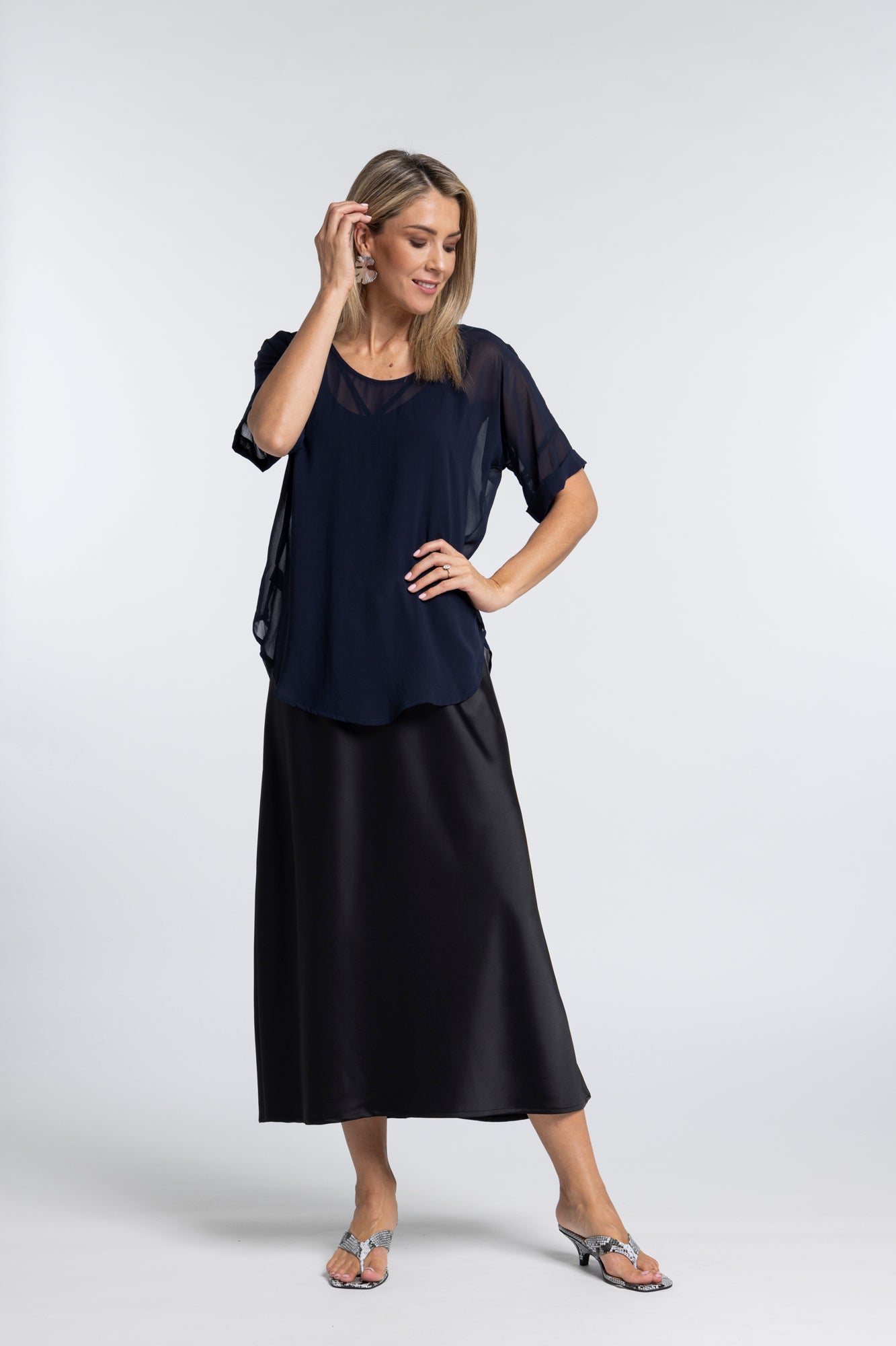 The NES Muse Satin Skirt – a full-length hammered satin skirt with bias cut, elasticated waist and soft high-low hem. Elegant and easy. NZ made.