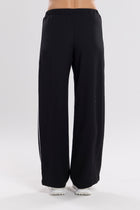The NES Piped Gin Pants – a best-selling fit with elastic waist, side piping and 32" length. Comfortable, polished and designed for everyday wear.