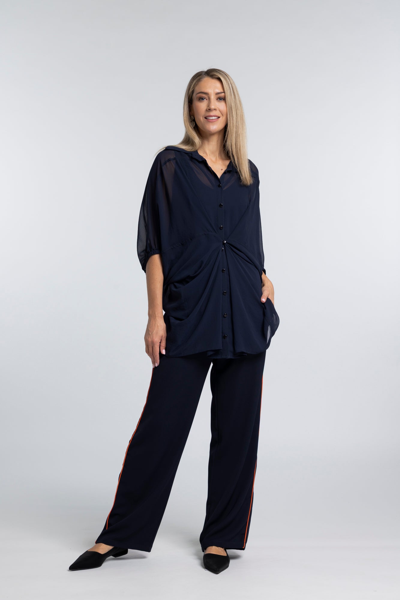 The NES Piped Gin Pants – a best-selling fit with elastic waist, side piping and 32" length. Comfortable, polished and designed for everyday wear.