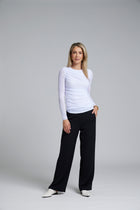 The NES Rumour Top by N-E-S – a sheer long-sleeve mesh top with front rouching and double-layered front. Sculpted, modern and NZ made.