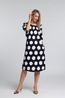Ease Dress - Signature Print with Effortless Movement

A playful take on a much-loved silhouette. The N-E-S Ease Dress returns in our summer signature print - an abstract black and white daisy design that brings a bold yet wearable edge to this feminine favourite.

Designed and made responsibly in New Zealand