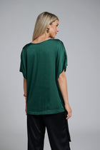 The NES Vanotti Tunic by N-E-S. A floaty scoop-neck tunic in viscose georgette or satin. Wear loose or drawn in. Sizes XS/S, SM, ML. NZ made.