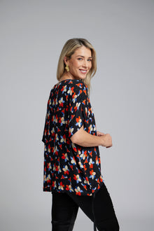 NES Vanotti Tunic by N-E-S  – a floaty scoop-neck tunic in viscose georgette or satin. Wear loose or drawn in. Sizes XS/S, SM, ML. NZ made.