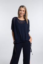 The NES Vanotti Tunic by N-E-S’ best-selling throw-on top with a scoop neckline and adjustable feature hem. Perfect over a Lattice Singlet. NZ made.