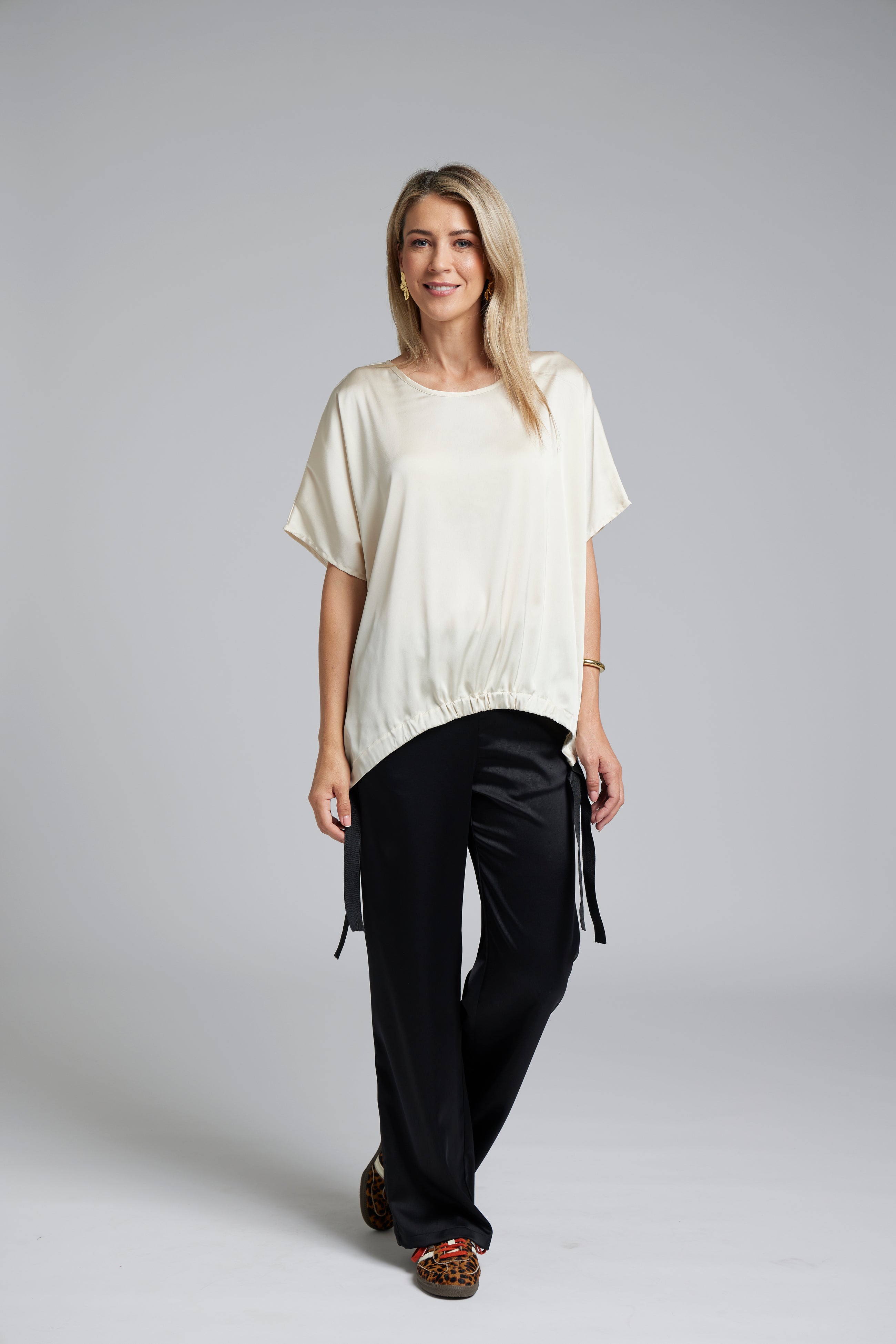 The NES Vanotti Tunic by N-E-S. A floaty scoop-neck tunic in viscose georgette or satin. Wear loose or drawn in. Sizes XS/S, SM, ML. NZ made.