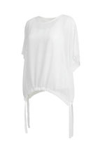 The NES Vanotti Tunic by N-E-S’ best-selling throw-on top with a scoop neckline and adjustable feature hem. Perfect over a Lattice Singlet. NZ made.