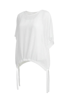 The NES Vanotti Tunic by N-E-S’ best-selling throw-on top with a scoop neckline and adjustable feature hem. Perfect over a Lattice Singlet. NZ made.