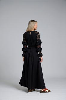 The NES Zadie Skirt by N-E-S – a full length ponte skirt with outward pleats, elastic back insert and clean modern fit. NZ made in Black or Latte.