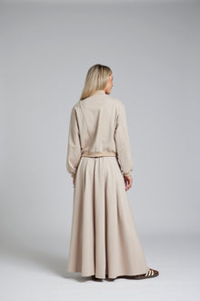 The NES Zadie Skirt by N-E-S – a full length ponte skirt with outward pleats, elastic back insert and clean modern fit. NZ made in Black or Latte.