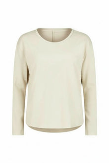 The NES Reya Top by N-E-S – a soft 100% merino long sleeve top with scoop neck, curved hem and bias cut sleeves. A winter essential. NZ made.