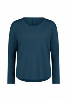 The NES Reya Top by N-E-S – a soft 100% merino long sleeve top with scoop neck, curved hem and bias cut sleeves. A winter essential. NZ made.