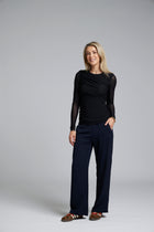 The NES Rumour Top by N-E-S – a sheer long-sleeve mesh top with front rouching and double-layered front. Sculpted, modern and NZ made.