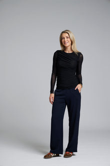 The NES Rumour Top by N-E-S – a sheer long-sleeve mesh top with front rouching and double-layered front. Sculpted, modern and NZ made.