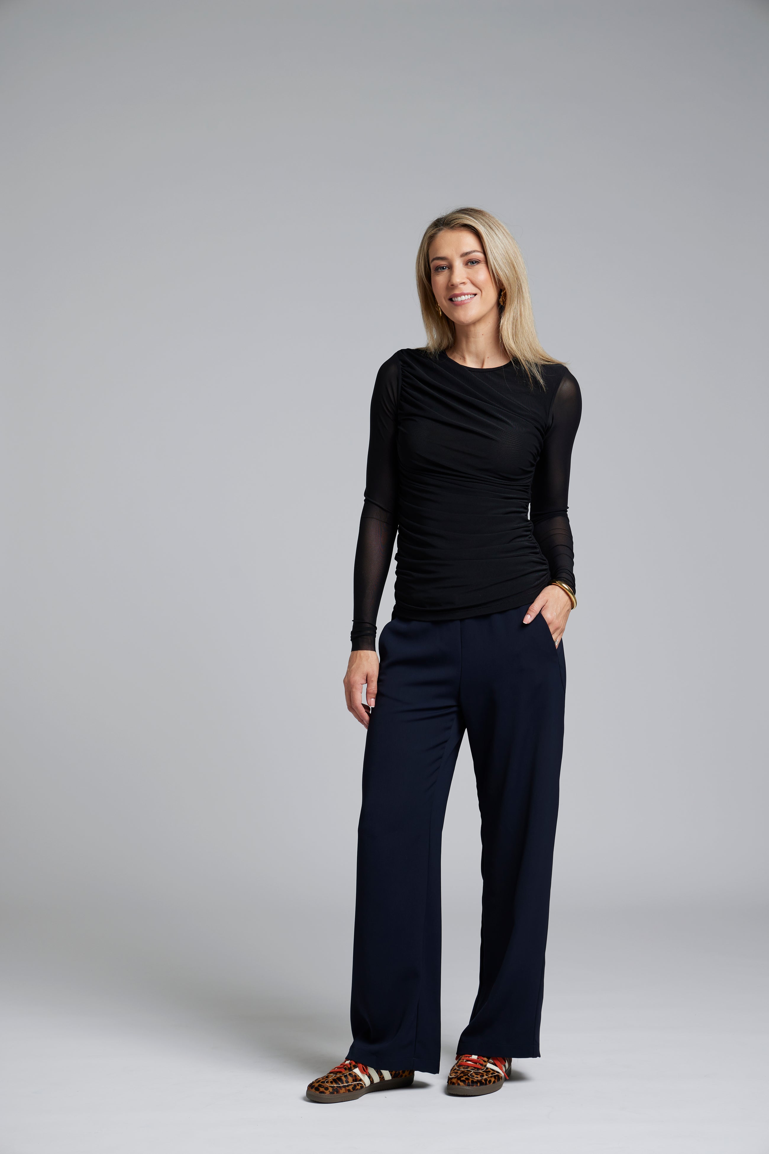The NES Rumour Top by N-E-S – a sheer long-sleeve mesh top with front rouching and double-layered front. Sculpted, modern and NZ made.
