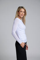 The NES Rumour Top by N-E-S – a sheer long-sleeve mesh top with front rouching and double-layered front. Sculpted, modern and NZ made.
