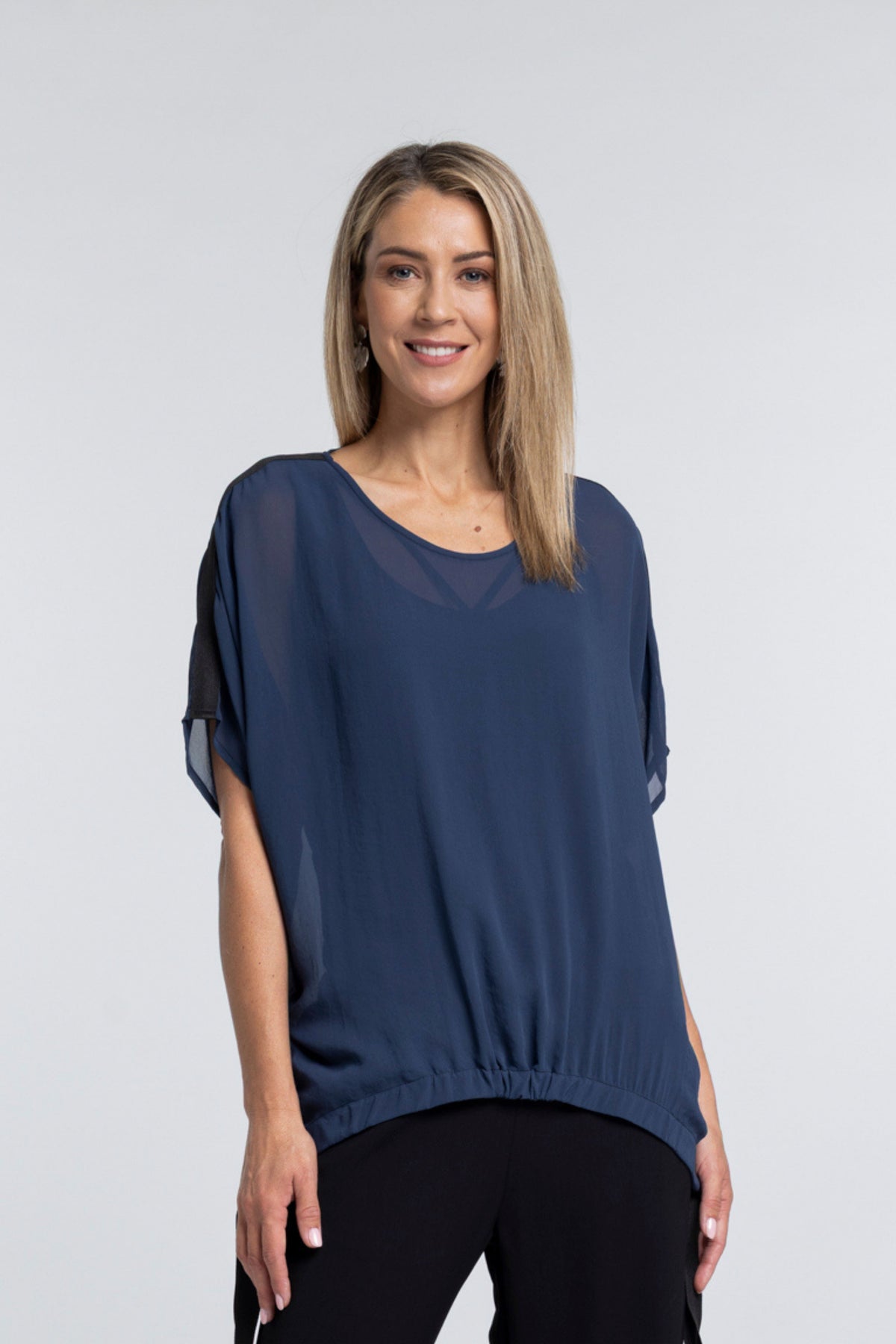 A true N-E-S icon, the Vanotti Tape Top is the piece customers return for season after season. Light, relaxed and beautifully easy to wear, it’s designed to be your effortless throw-on style for days when comfort and simplicity matter most.