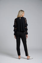 NES Luxa Top by N-E-S – a black merino long sleeve with ruffled lace dolman sleeves, subtle gathers and keyhole back. Sculptural, modern and NZ made.