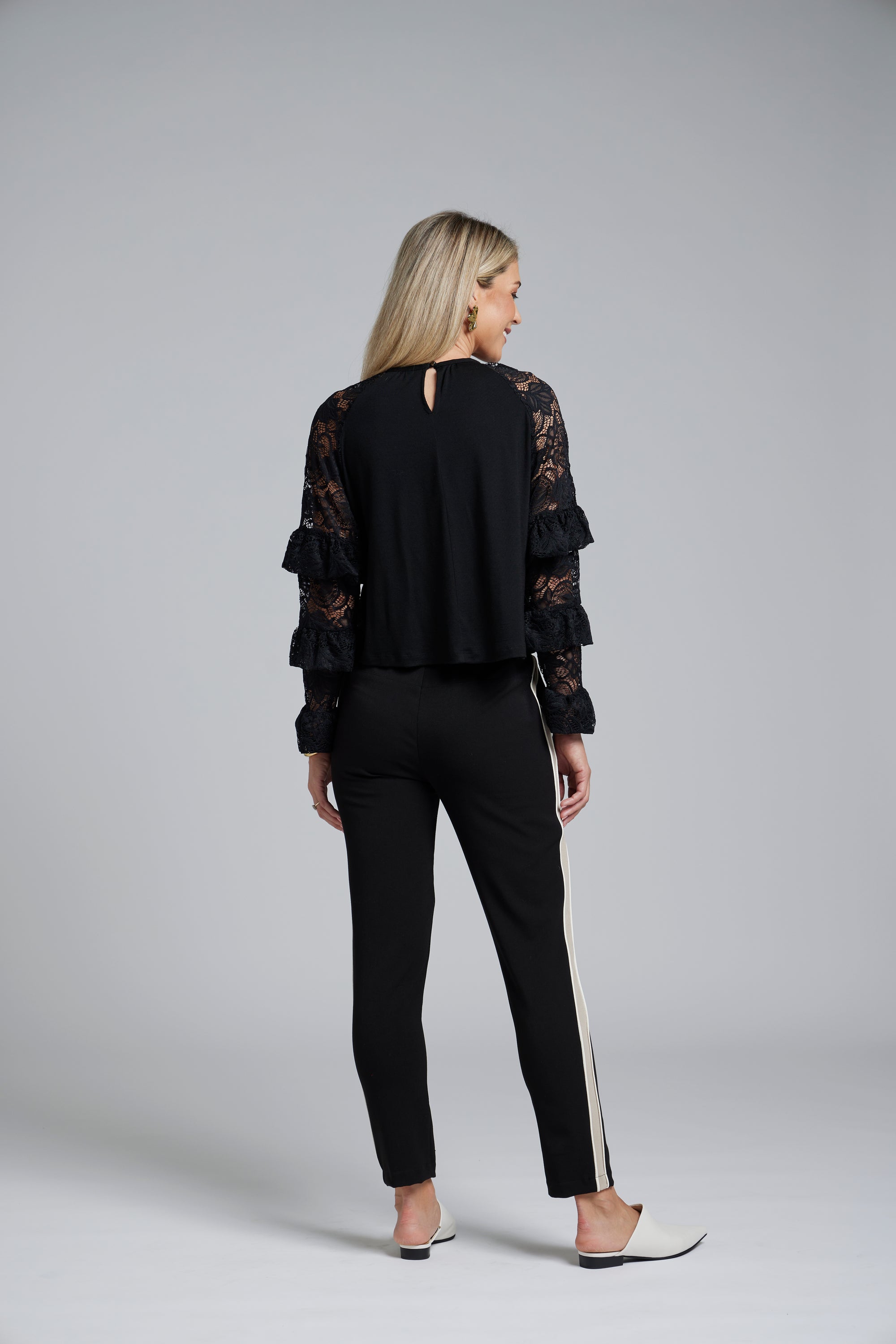 NES Luxa Top by N-E-S – a black merino long sleeve with ruffled lace dolman sleeves, subtle gathers and keyhole back. Sculptural, modern and NZ made.