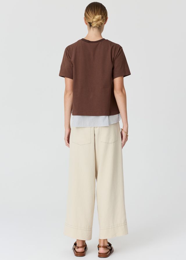 POL CLOTHING
MIREL T-SHIRT
Featuring a cotton jersey overlayer and a striped shirting underlayer, the Mirel Multimedia T-shirt is the best of both worlds - giving you a layered look with minimal effort.
available in black and choc