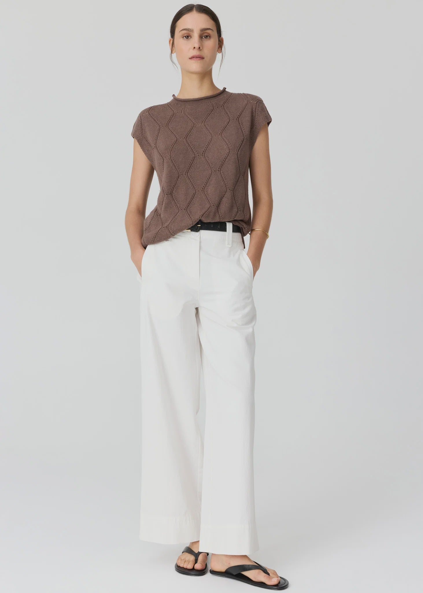 POL CLOTHING
The Rosin Cable Knit is an elevated knit top made in a cotton/linen blend perfect for Spring.
-Round neckline with rolled edge.
-Extended shoulder creates a cap sleeve effect.
-Diamond shape stitch with pointelle detains throughout.
-Relaxed fit.
-Ribbed hem.
-Longerline silhouette with side splits for easy tucking.
available in choc and white