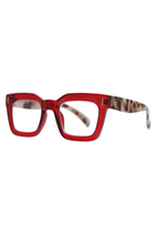 REALITY EYEWEAR
A bold blend of colour and pattern, with a striking tortoiseshell arm on the Ruby and Wood that add a playful, unexpected twist.&nbsp;The chunky rectangular frame delivers vintage-inspired confidence, while the rich colour mix makes them as much a fashion statement as they are functional. Also available in classic brown and vibrant blue, Keats proves that reading glasses can be anything but ordinary.