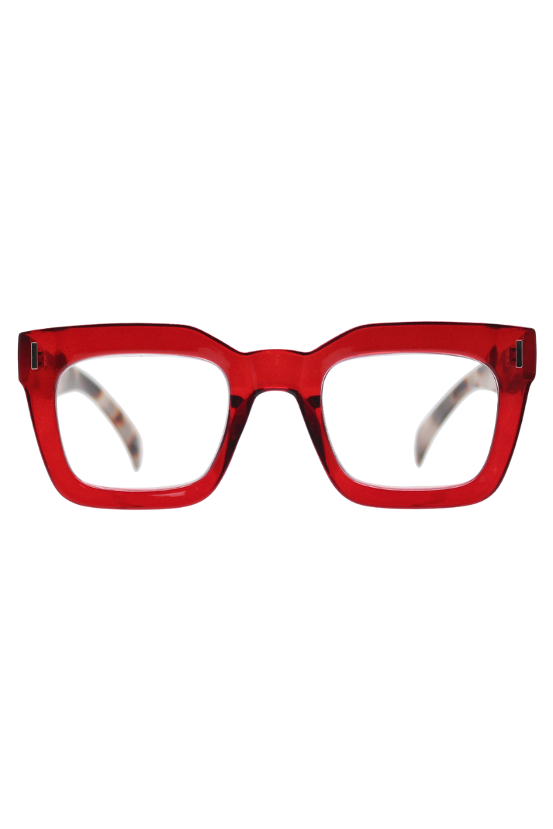 REALITY EYEWEAR
A bold blend of colour and pattern, with a striking tortoiseshell arm on the Ruby and Wood that add a playful, unexpected twist.&nbsp;The chunky rectangular frame delivers vintage-inspired confidence, while the rich colour mix makes them as much a fashion statement as they are functional. Also available in classic brown and vibrant blue, Keats proves that reading glasses can be anything but ordinary.