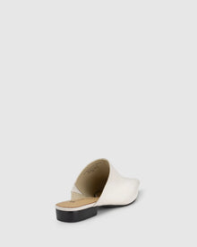 CHAOS &amp; HARMONY | VALOR MULE

Soft and clean, the VALOR MULE in Milk is crafted from recycled leather with a sleek pointed toe. This refined neutral adds a polished touch to everything from workwear to weekend denim.

Milk recycled leather pointed mule
Soft leather lined
Black stack heel / Black rubber outsole
20mm / 0.78 inch heel
Standard fit
We recommend a good leather/suede protectant to protect your shoes
Made in Dongguan, China