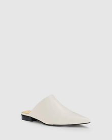 CHAOS &amp; HARMONY | VALOR MULE

Soft and clean, the VALOR MULE in Milk is crafted from recycled leather with a sleek pointed toe. This refined neutral adds a polished touch to everything from workwear to weekend denim.

Milk recycled leather pointed mule
Soft leather lined
Black stack heel / Black rubber outsole
20mm / 0.78 inch heel
Standard fit
We recommend a good leather/suede protectant to protect your shoes
Made in Dongguan, China