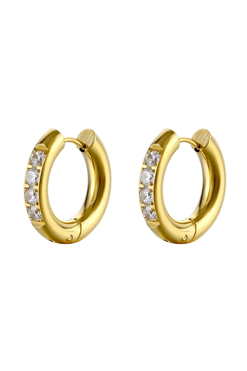 The PĀMU ZIGGY HOOPS in GOLD. A simple and traditional design with a bit of added sparkle.&nbsp; Great on their own or layered with any of our other earrings.


PĀMU jewellery is made to be worn everywhere, every day. Our pieces are water proof, sweat proof, ocean proof, nickel free and hypoallergenic.


Premium Stainless Steel + 18k gold PVD coating