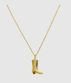 Cowboy Necklace by Castel & Co is a gold-plated stainless steel necklace featuring a detailed cowboy boot pendant on a slim chain. Playful yet stylish design that works well for layering or wearing solo as a statement piece. Necklace length 40 + 5 cm extension, secured with a lobster claw clasp. Lightweight (10g), waterproof, and hypoallergenic.