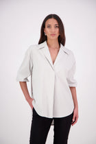 The NES Fara Shirt – a feminine shirt with shirred sleeves, V-neck and back detail. Lightweight, versatile and NZ made.