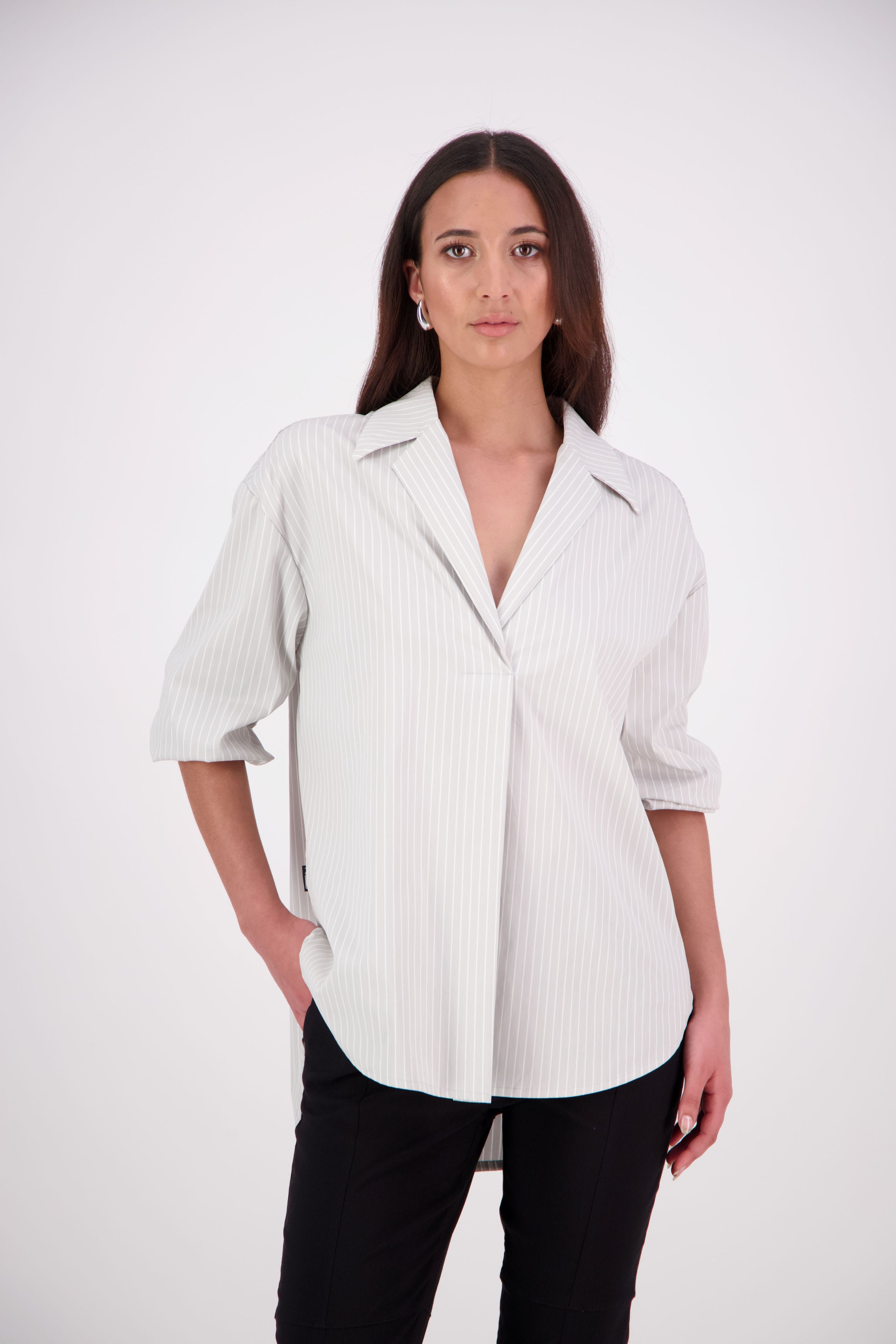The NES Fara Shirt – a feminine shirt with shirred sleeves, V-neck and back detail. Lightweight, versatile and NZ made.