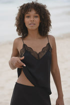 The LILLY PILLY FRANKIE SILK CAMI is made with 100% bluesign-certified silk for a luxurious feel. Boasting a bias cut and lace accents on the front and back, this cami features French seams for a polished touch.

∙ Bias cut silk cami
∙ Lace neckline front and back
∙ French seam